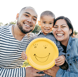 Hispanic family with young son